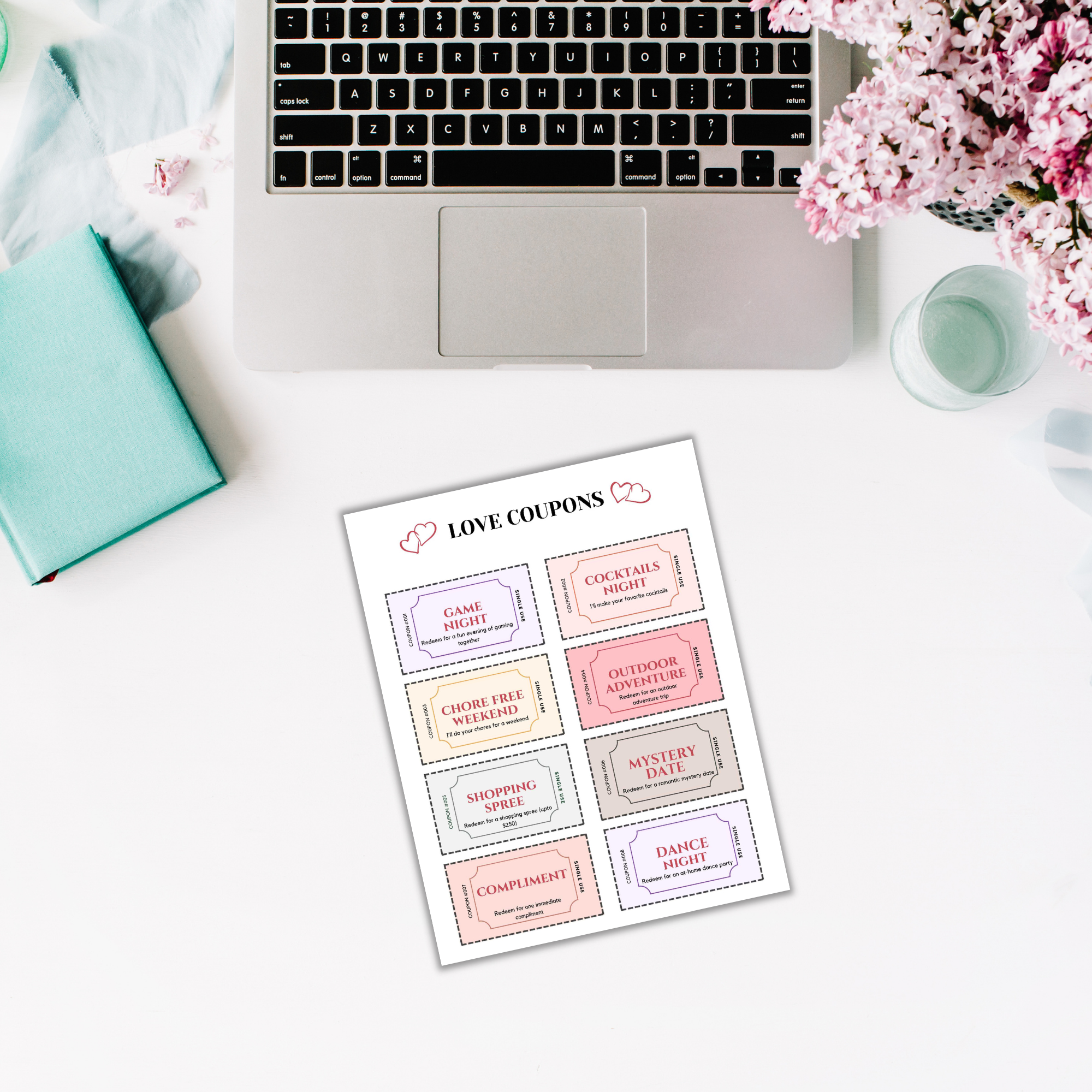 a laptop computer sitting on top of a white desk
