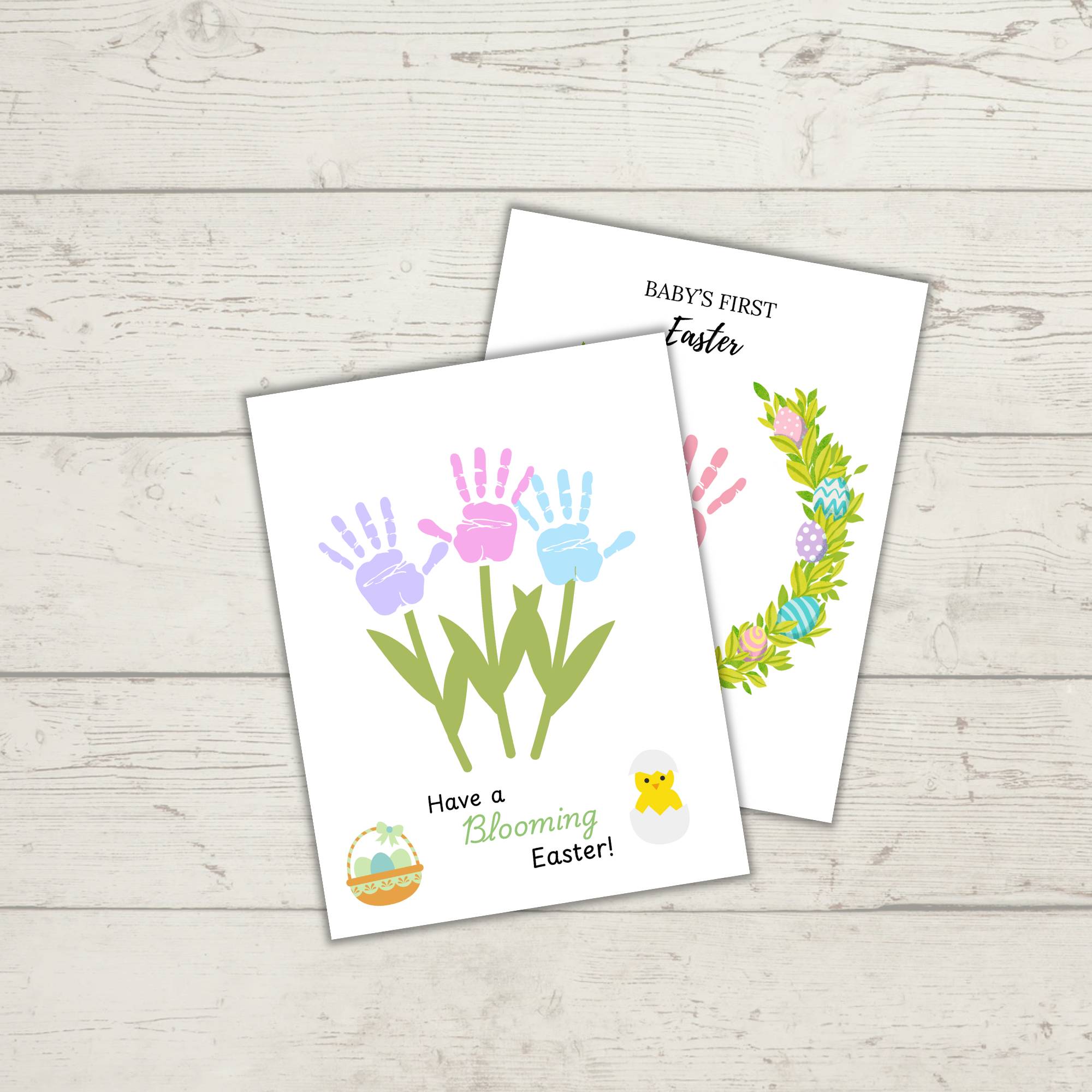 Two Easter-themed cards sit charmingly on wood: one with handprint flowers and "Have a Blooming Easter!" text, the other with a floral wreath for "Baby's First Easter," both enchanting elements of the Delivery Driver Signs Bundle PLR.