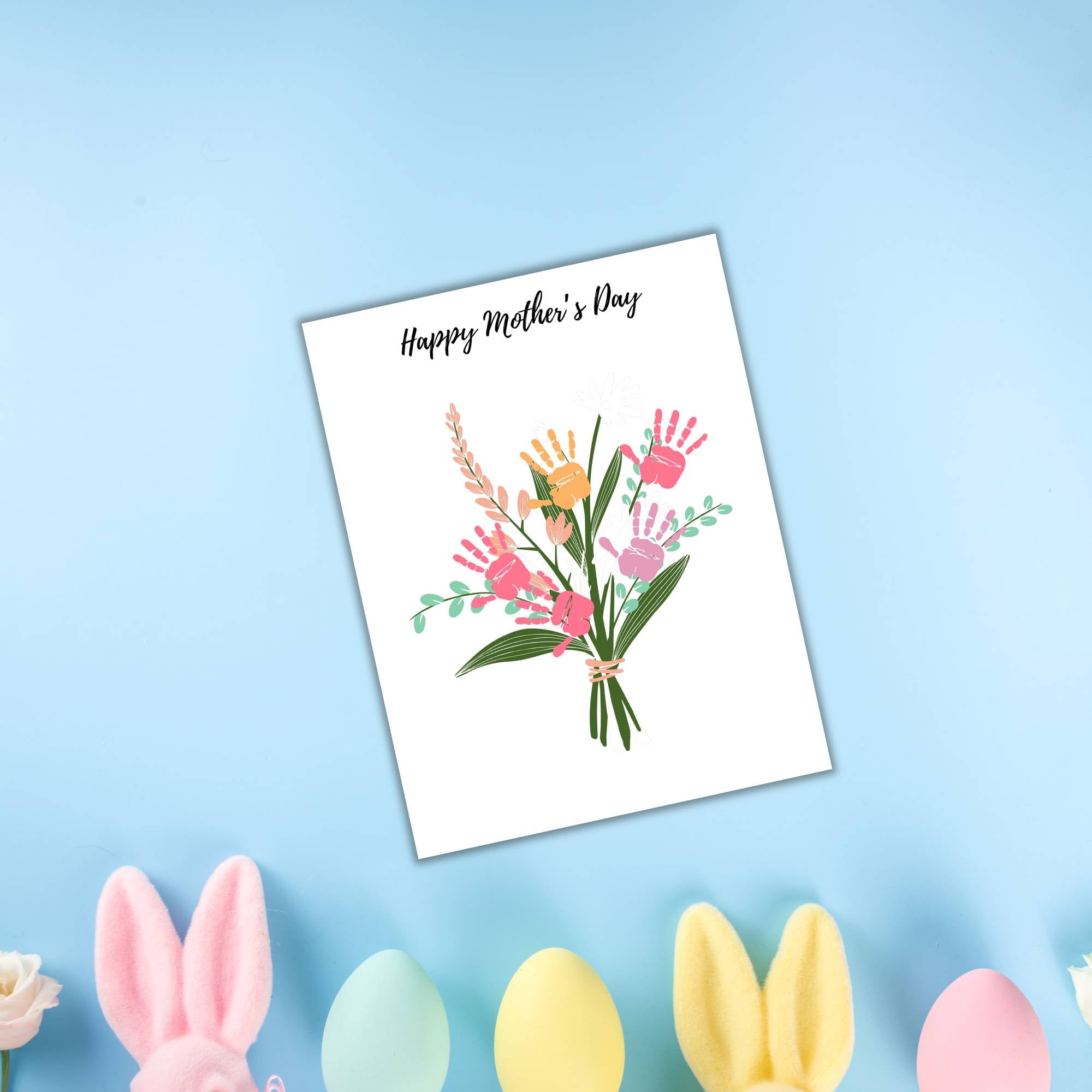 Mother's Day card from the Delivery Driver Signs Bundle PLR features a bouquet illustration, pink handprints, and "Happy Mother's Day" text. The backdrop of colorful eggs and bunny ears on a light blue surface adds a special touch for delivery drivers.