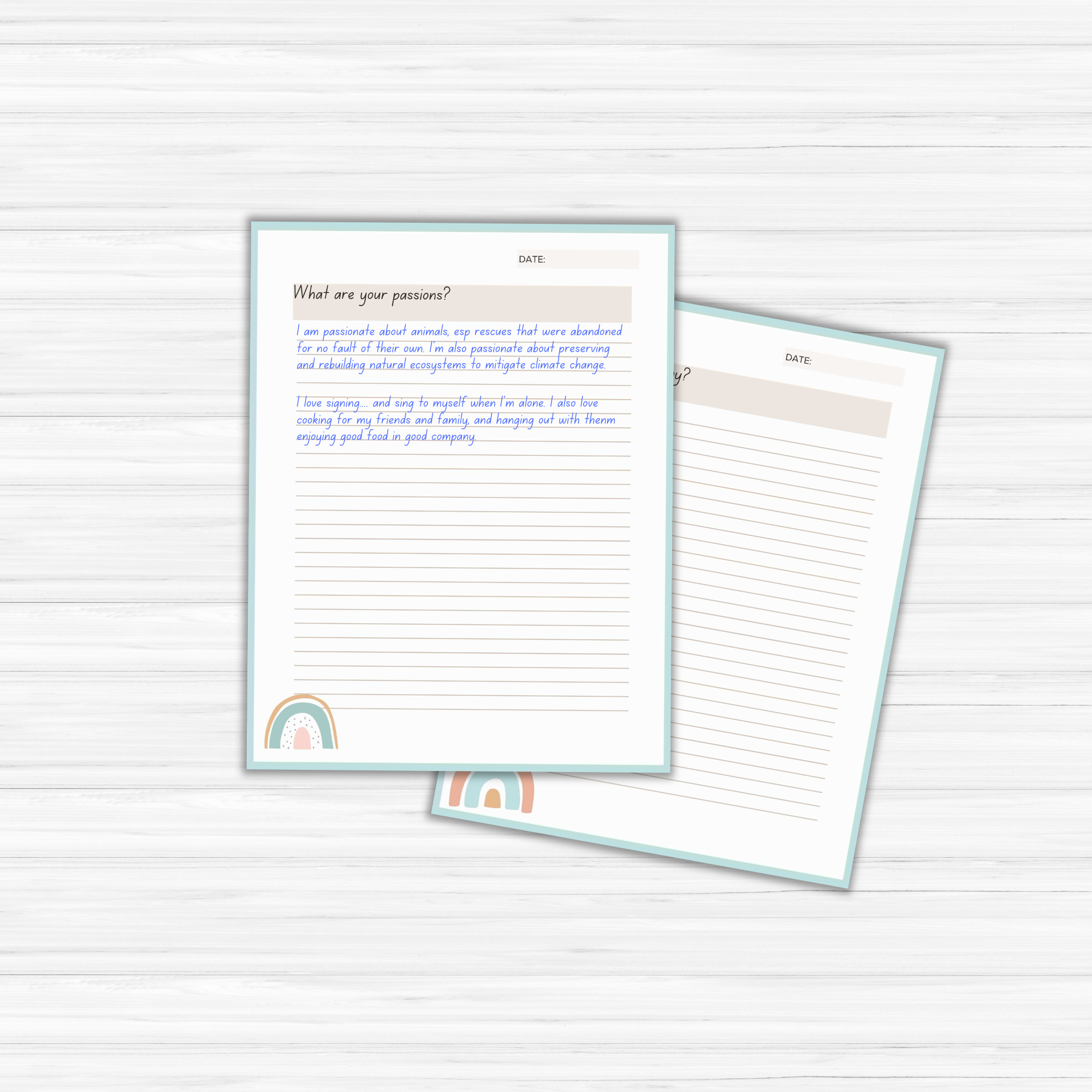 The 'Find Your Purpose' Journal contains two sheets of lined paper featuring rainbow and heart graphics. The top sheet is titled "What are your passions?" and includes handwritten prompts to help you discover your purpose through introspective journaling.