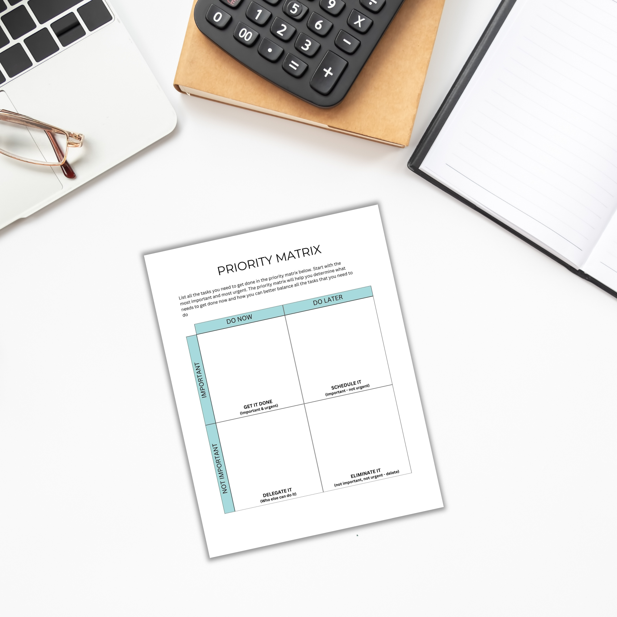 On a desk sits a priority matrix worksheet surrounded by The Goal-Setting Planner, glasses, and a calculator, with an open notebook nearby for goal-setting.