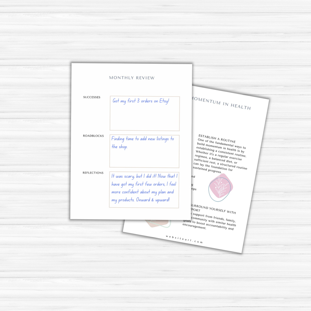 Two sheets of paper rest on a light wood surface. The first sheet is part of The Power of Momentum Journal & Workbook, detailing successes, roadblocks, and reflections. The second sheet provides additional support with tips for maintaining momentum in health.